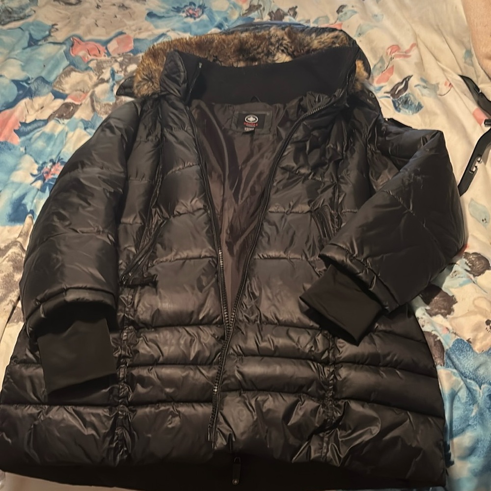 Winter Coat by Halifax very warm has fur around hat worn one winter.